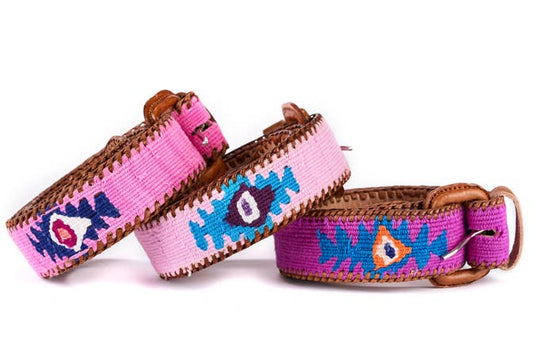 Handcrafted Guatemalan leather belts in vibrant colors with bohemian-inspired designs, perfect for adding a pop of style to any look.