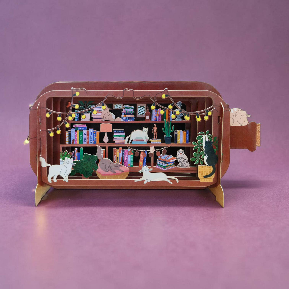 Pop-up-kort med kattebibliotek