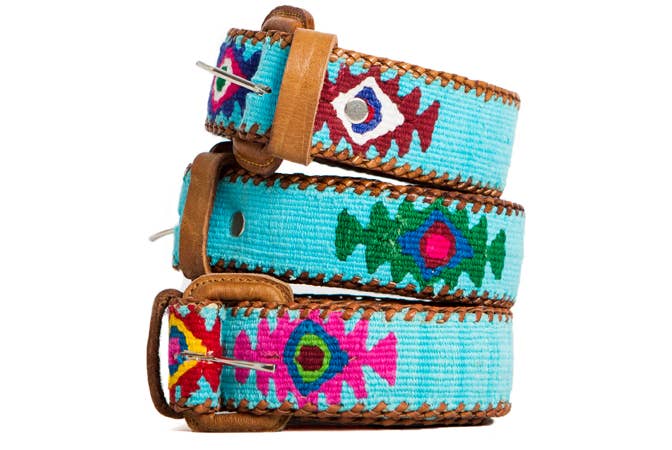 Handcrafted Guatemalan leather belts in vibrant colors with bohemian-inspired designs, perfect for adding a pop of style to any look.